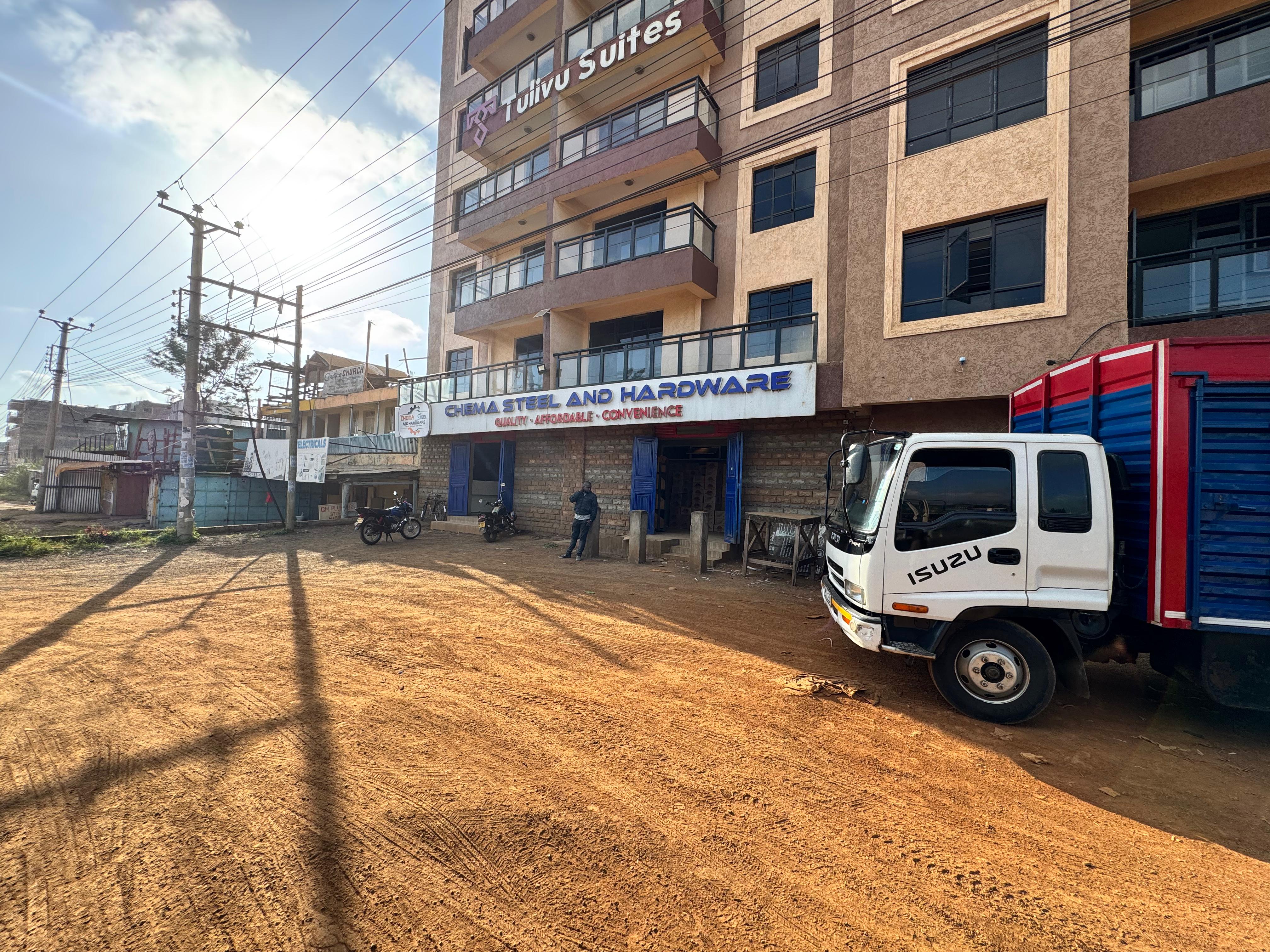 Chema Steel storefront and delivery truck
